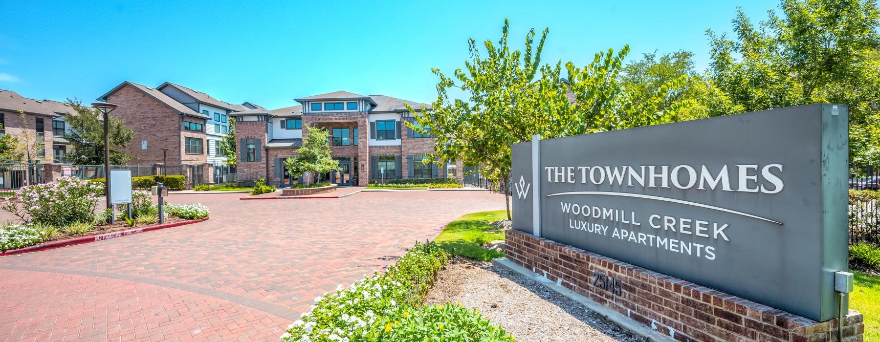 a sign in front of a building