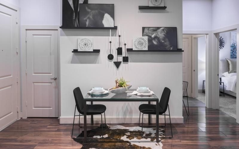 a dining room table with chairs